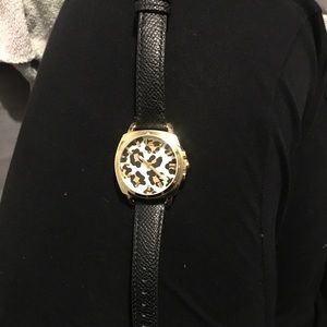 Coach watch black strap cheetah face gold frame